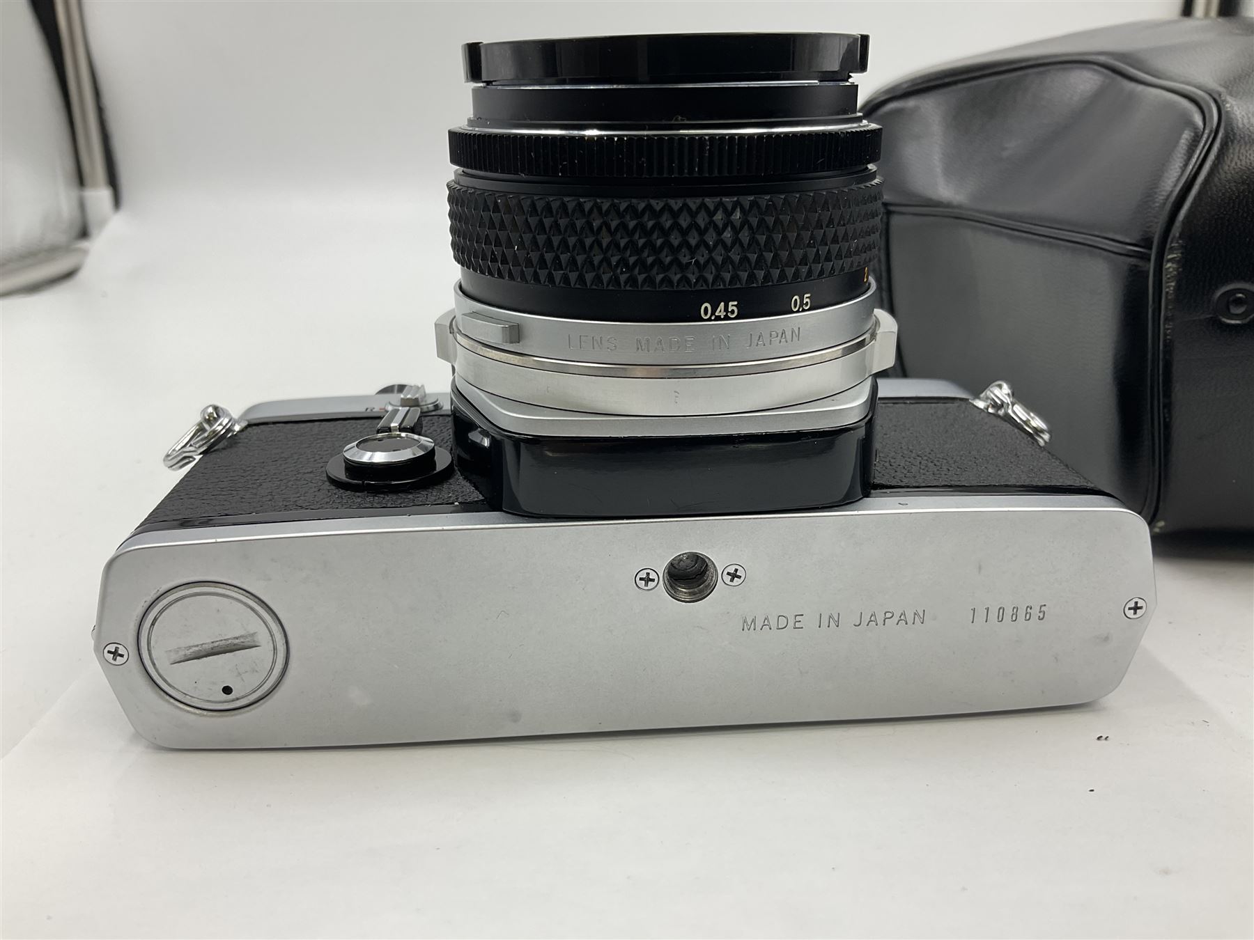 Olympus M-1 camera body, serial no. 110865, circa 1972, with ' Olympus M-System F.Zuiko Auto-S 1:1.8 f=50mm' lens, serial no. 105152, in leather case 