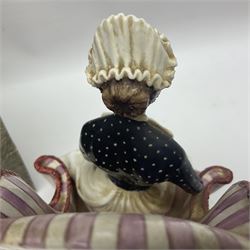 Royal Worcester limited edition figure, Sister St Thomas Hospital (London), no 180/500, modelled as a nurse in uniform, sitting on a striped wingback chair, with printed mark beneath, in original box with certificate, H16cm