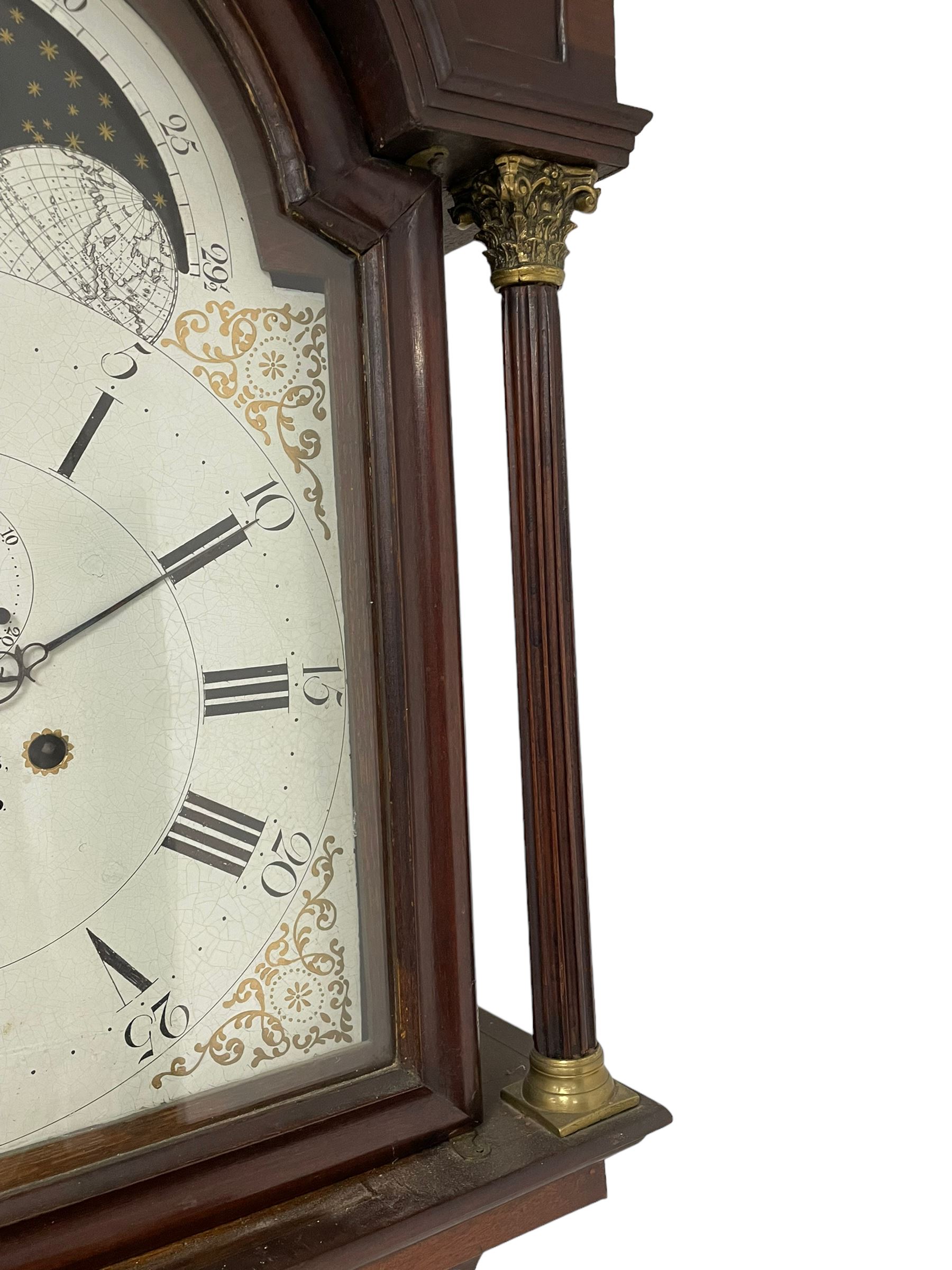 W. Phillips of Bromyard - 8-day mahogany longcase with a painted moon roller dial, c 1790,
swans neck pediment with dog tooth moulding, raised carving and  brass paterie, break arch hood door beneath flanked by reeded pilasters with brass Corinthian capitals, trunk with a blind fret, reeded quarter columns and long wavy topped door,
Plinth with a deep moulding and canted corners raised on a shaped base, painted dial with gesso spandrels, Roman numerals, five minute Arabic's and minute dots, with steel hands, seconds dial and square date aperture, dial pinned to a rack striking movement with an anchor escapement, striking the hours on a cast bell. A clockmaker by the name of John Phillips is recorded as working in Bromyard (Worcs)  in the early to mid 18th century, certainly by 1770-90. W. Phillips was possibly an unrecorded son or brother also working in the same family clockmaking business during the later part of the 18th century.
