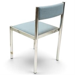 Set of eight 1980s chrome and upholstered dining chairs, curved back bar over padded seats upholstered in blue fabric, on tubular chrome frames