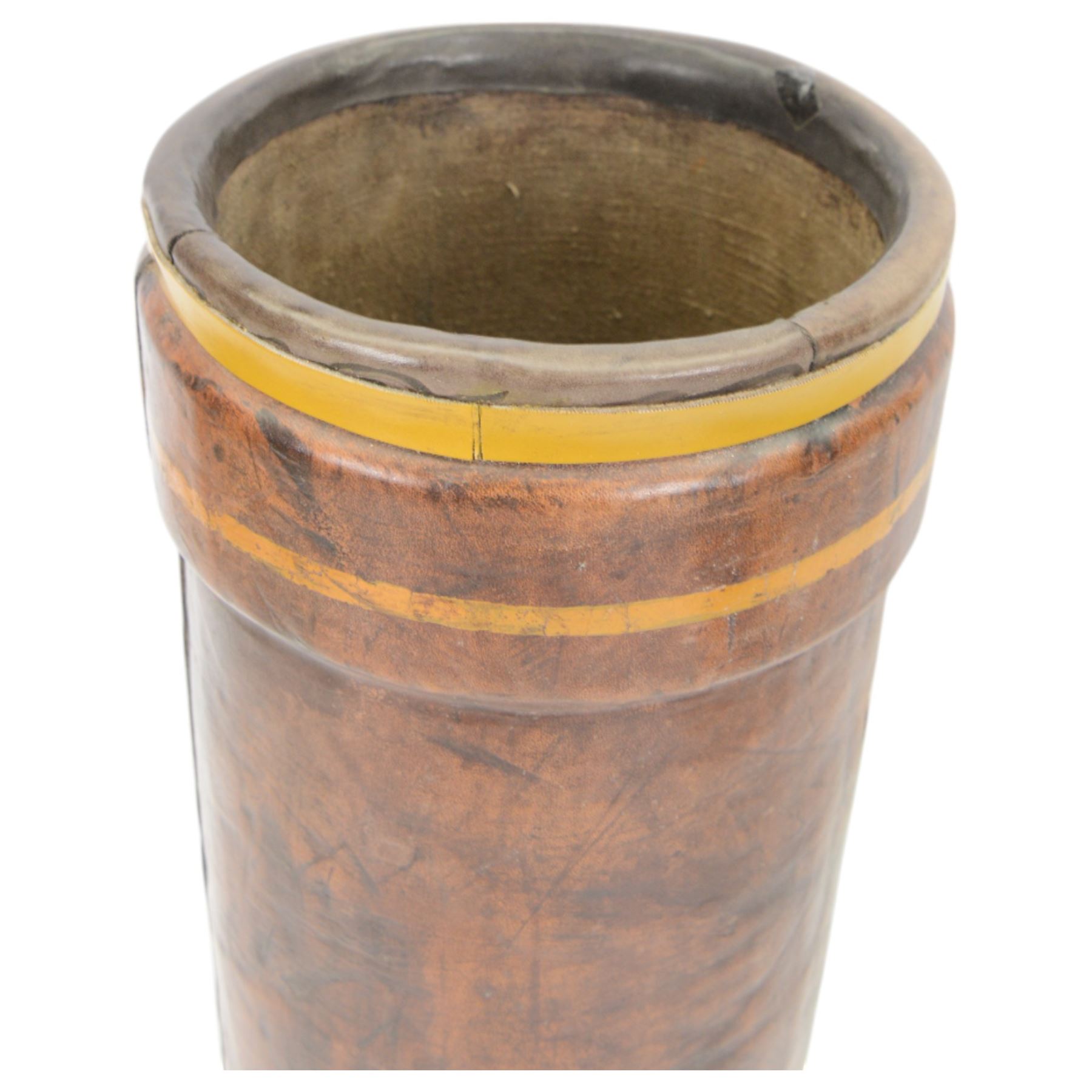 Early 20th century leather artillery shell case by Barrow, Hepburn & Gale Ltd, decorated a transfer printed coat of arms and an impressed N, with a strap handle, the base stamped 'No 58 III BH & G Ltd, together with another artillery shell case