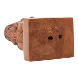  Two wooden netsuke, in the forms of a foo dog and a chicken, both signed to the base, H6cm