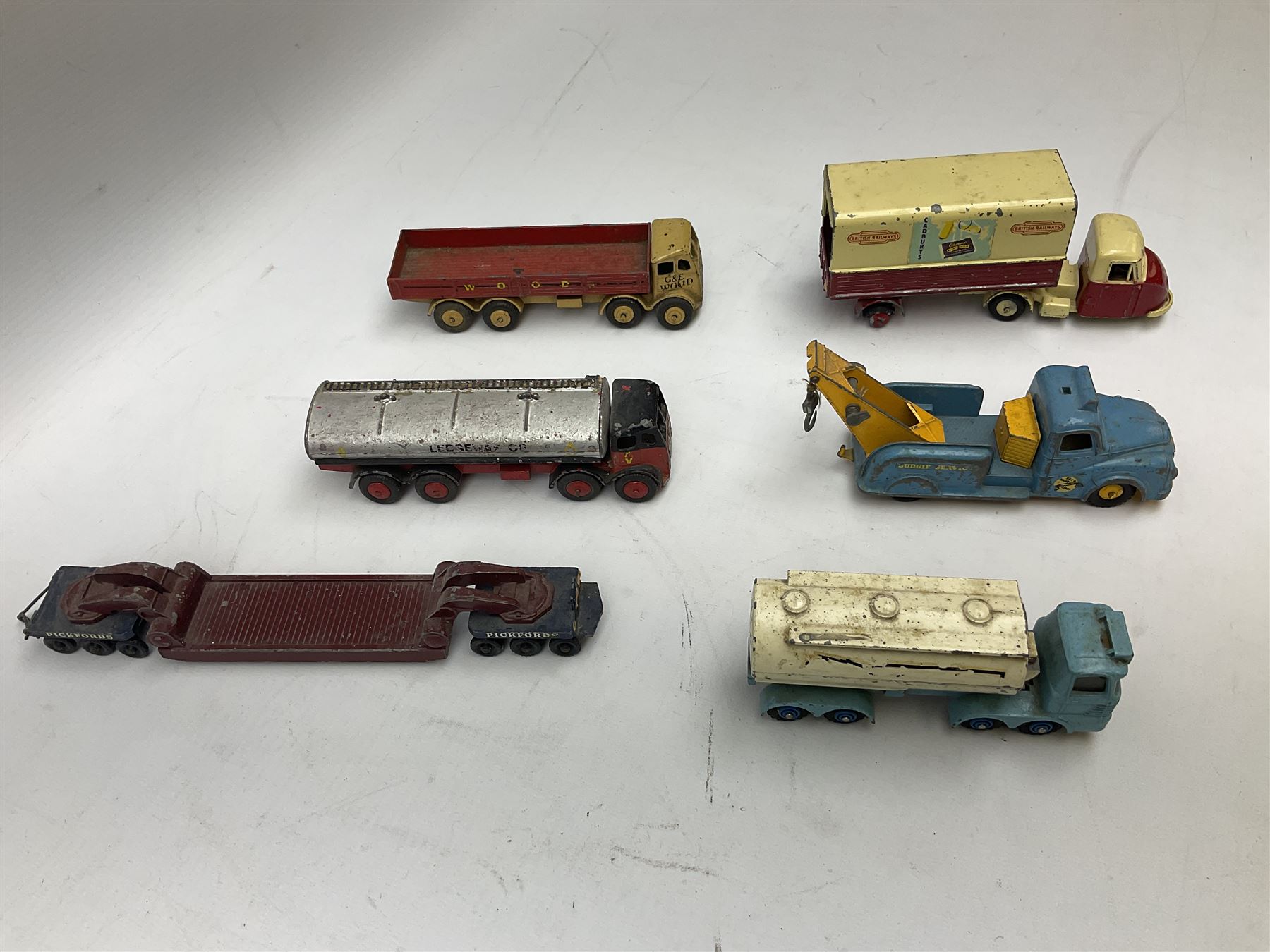 Budgie - five unboxed and playworn die-cast commercial vehicles comprising Scammell Scarab with BR Semi-Trailer, Volkswagen Pick-Up, Towing Tender & Breakdown Truck, Highwayman Transporter No.326 and Routeman Pneumajector No.322; Morestone G&E Wood open lorry and Petrol Tanker; nine early Lesney models; and small quantity of others by various makers