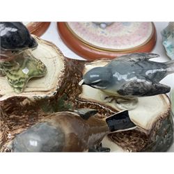 Nine Beswick bird figures, with stand, together with USSR thrush, two Franklin Mint Jane Austin figures and four Royal Doulton figures 