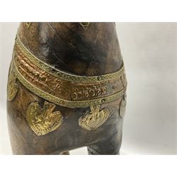 Wooden horse with a copper and brass saddle and decoration, H41cm 