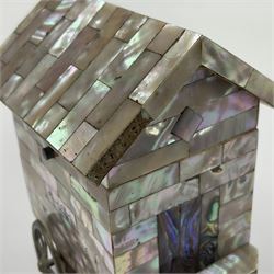 19th century French souvenir jewellery casket in the form of a bathing machine, having mother of pearl panelled tiled effect body, hinged roof/cover revealing a blue silk fitted interior with cushioned base, two silvered metal wheels, abalone shell door and mother of pearl steps, inscribed 'Berck Plage' in blue, H12cm, W13cm 