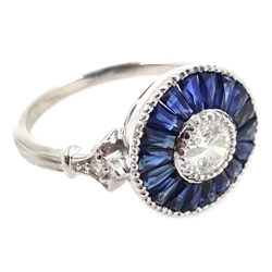  Platinum (tested) diamond and sapphire target ring, the central diamond approx 0.5 carat  