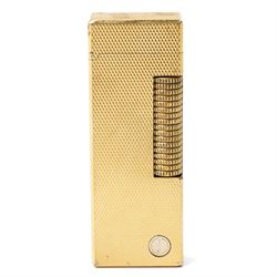 Dunhill - Rollagas lighter, gilt metal with engine-turned decoration and ribbed thumbpiece, H6.5cm 