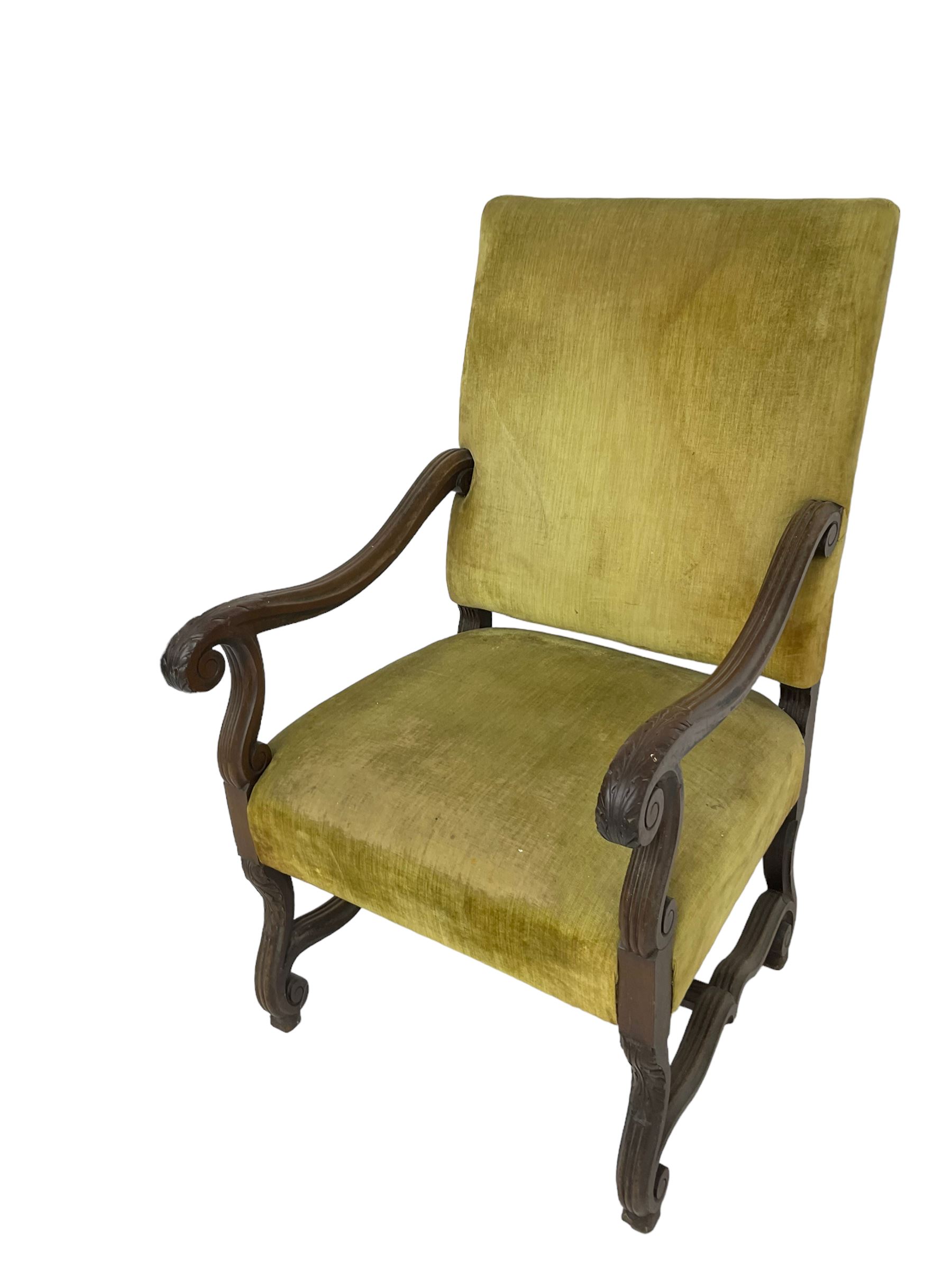 Early 20th century Carolean design mahogany framed throne chair, back and sprung seat upholstered in sage green fabric, scrolled amd reeded arms with carved oak leaf design, shaped supports with scroll feet united by waived stretchers