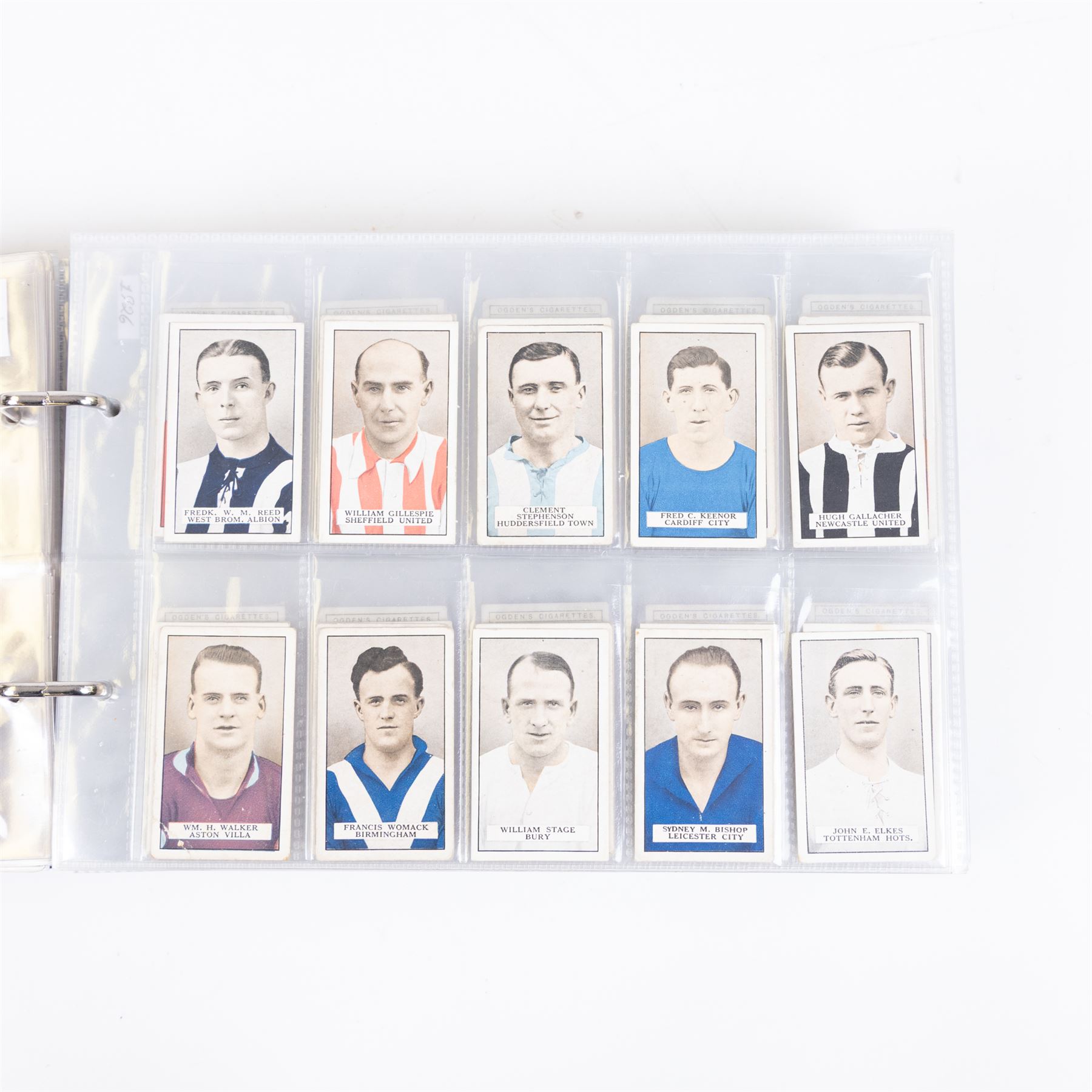Collection of Edwardian and later Football related trading and cigarette cards, including forty-nine of fifty 1906 Ogden's Football Club Colours, 1922 PALS Footall series, ninety of one hundred 1925 Gallaher Famous Footballers, complete set of forty-four 1926 Ogden's Captains of Association Football Clubs and Colours, complete set of fifty 1927 Players Football Caricatures by MAC,  complete set of fifty 1927 Players Football Caricatures by RIP,  complete set of fifty 1930 Players Association Cup Winners, complete set of 50 1933 Ogdens AFC Nicknames etc, housed in brown cigarette card album