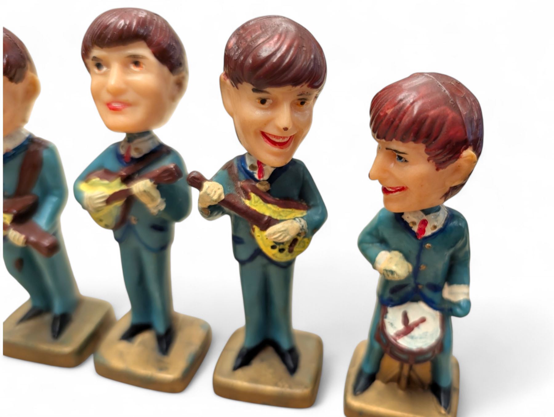 Set of four The Beatles plastic nodding / bobble head figures, H10cm