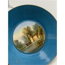 19th century Sevres style cabinet cup and saucer, the cup painted with rectangular panel of figures before Elysee Palace, set within a landscape with swans upon a lake to the fore, within a scrolling gilt border faintly titled Elysee, the saucer painted to the centre with boat upon a lake, upon a bleu celeste ground, each with interlaced L's beneath, cup with date letter, cup H7cm saucer D12.5cm
