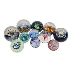 Collection of glass paperweights, including Selkirk and Caithness examples, all boxed 