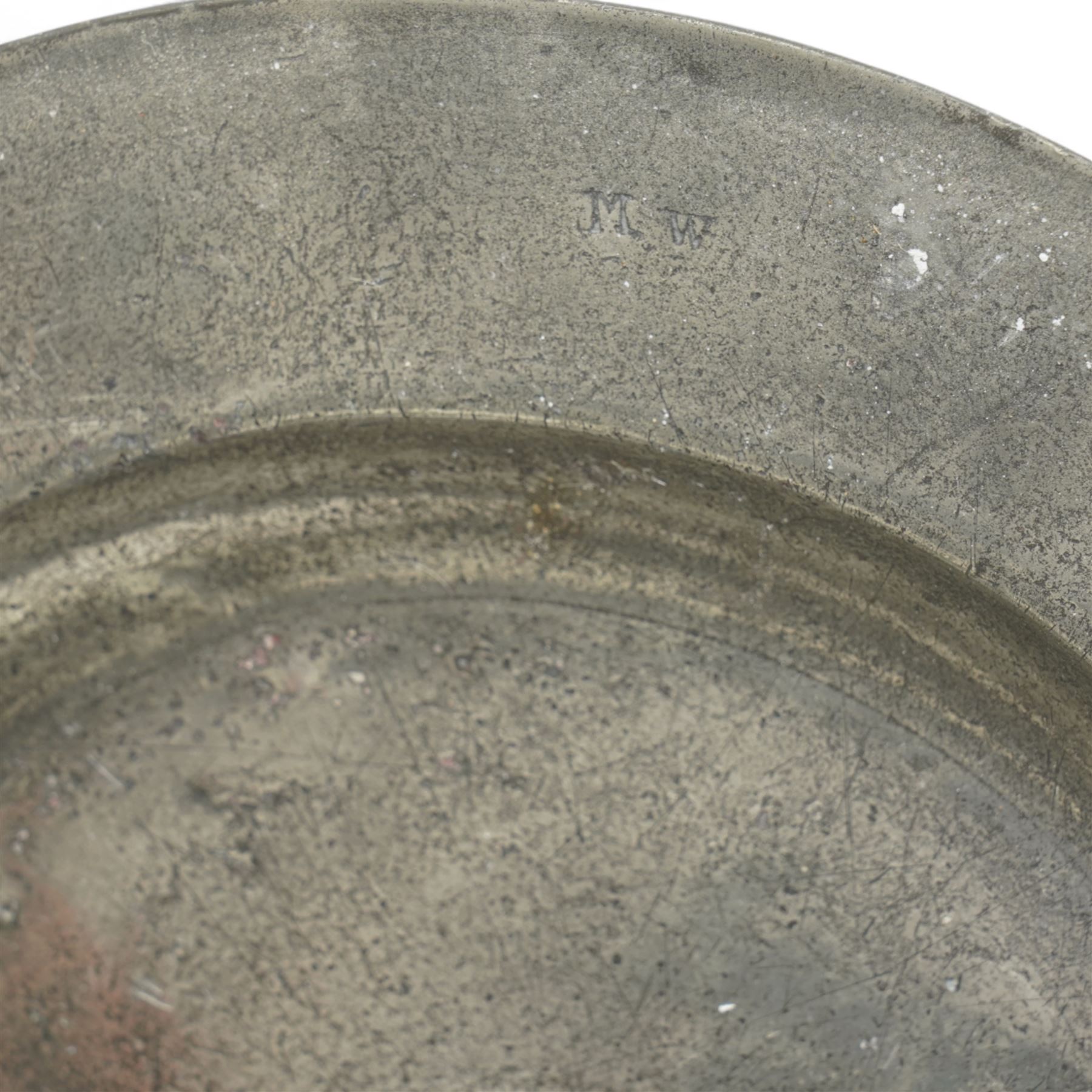 Large collection of 18th century and later pewter plates, of graduating sizes, and a group of tankards, various touch marks and impressions