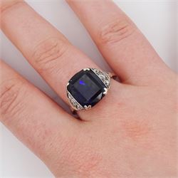Art Deco silver single stone unheated Ceylon sapphire ring, with three old cut diamonds set either side, sapphire approx 5.70 carat, total diamond weight approx 0.25 carat