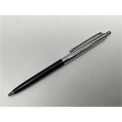 Three fountain pens, to include Conway Stewart 'Dinkie 550' and 'Conway 57' and a Parker 'Slimfold', all with 14ct gold nibs, together two roller ball pens, including a Parker example and a Swarovski Crystal paperweight