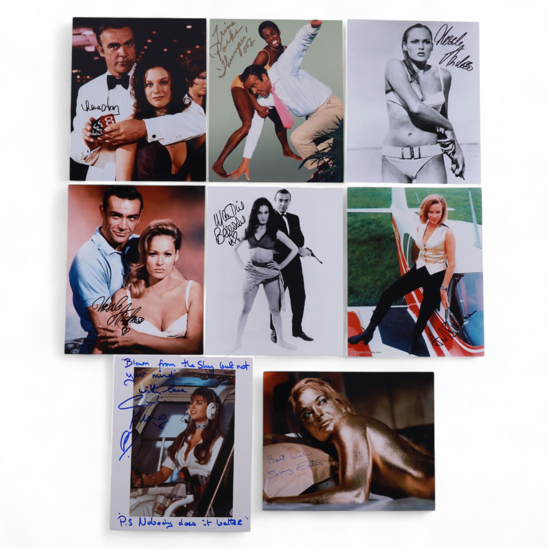 Eight James Bond signed 10 x 8