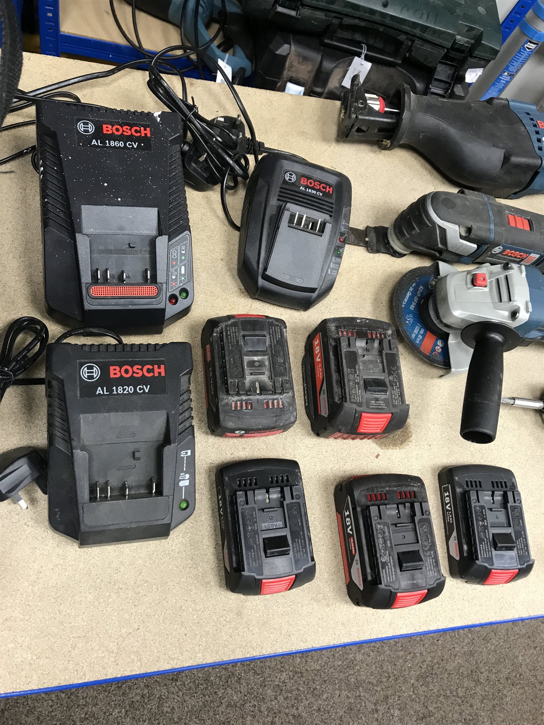 A quantity of Bosch Professional power tools including the GSB 18-2LI plus drill, GOP18V V-EC multi tool, GWS 18V-LI angle grinder, GDR 18-Li drill and a GSA 18 V-LI reciprocating saw with carry bag