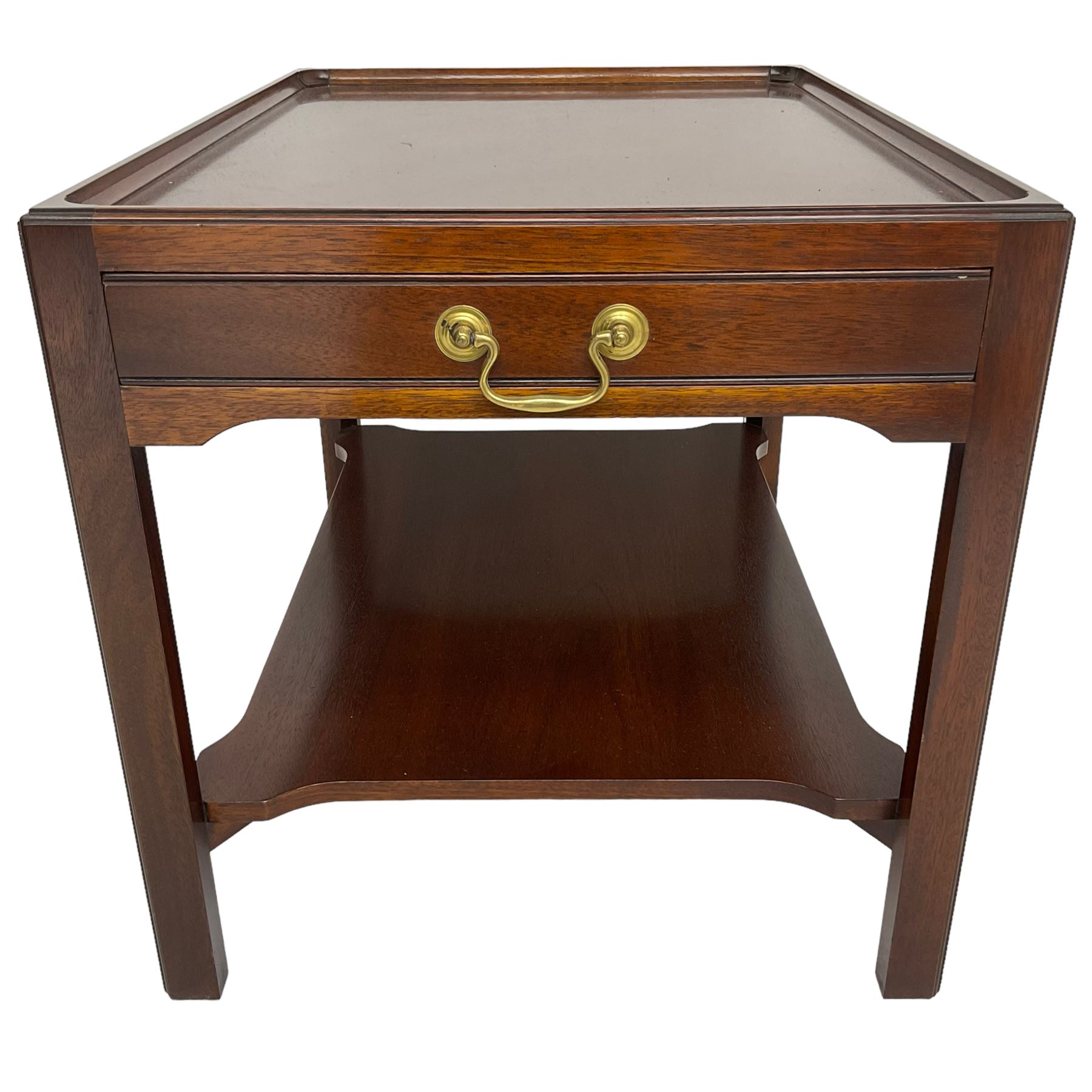 Mahogany side table or end table, the dished rectangular top with moulded edge, fitted with single end drawer, moulded square supports with inner chamfer united by under-tier 