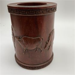 A Chinese hardwood brushpot, carved Bitong carved in relief with Water Buffalo, signed with seals and calligraphy, H14.5cm D11cm.