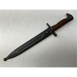 Swiss Model 1957 SIG rifle bayonet by Wenger with 23.5cm steel blade numbered 350857; in plastic scabbard with leather frog stamped GSCH 85 L38cm overall; and Egyptian Hakim rifle bayonet with the same script number to the grip and steel scabbard (2)