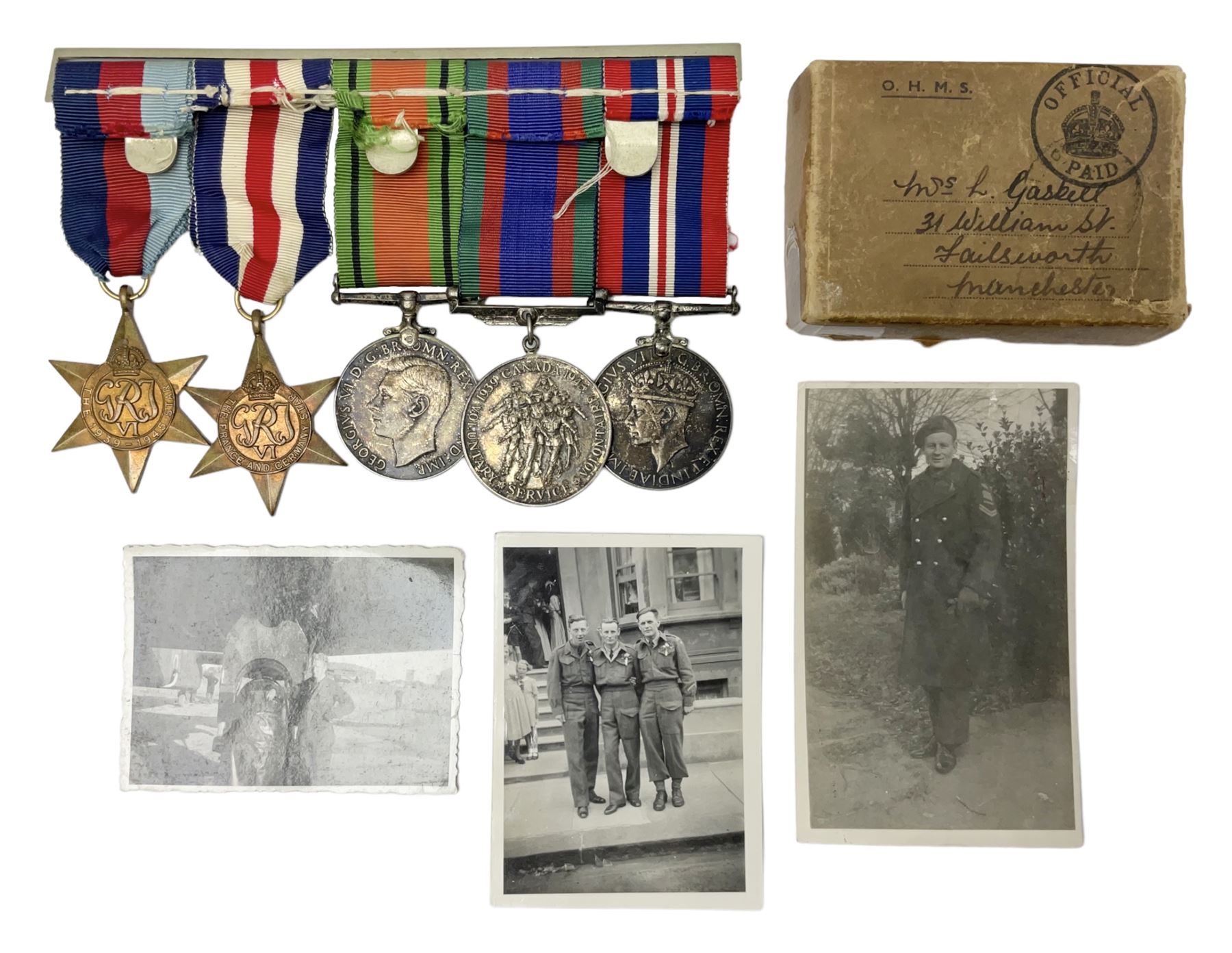 WW2 group of five medals comprising 1939-1945 War Medal, Defence Medal, 1939-1945 Star, France and Germany Star and Canadian Volunteer Service Medal; on wearing bar with ribbons; with a medal box and slip and three photographs
