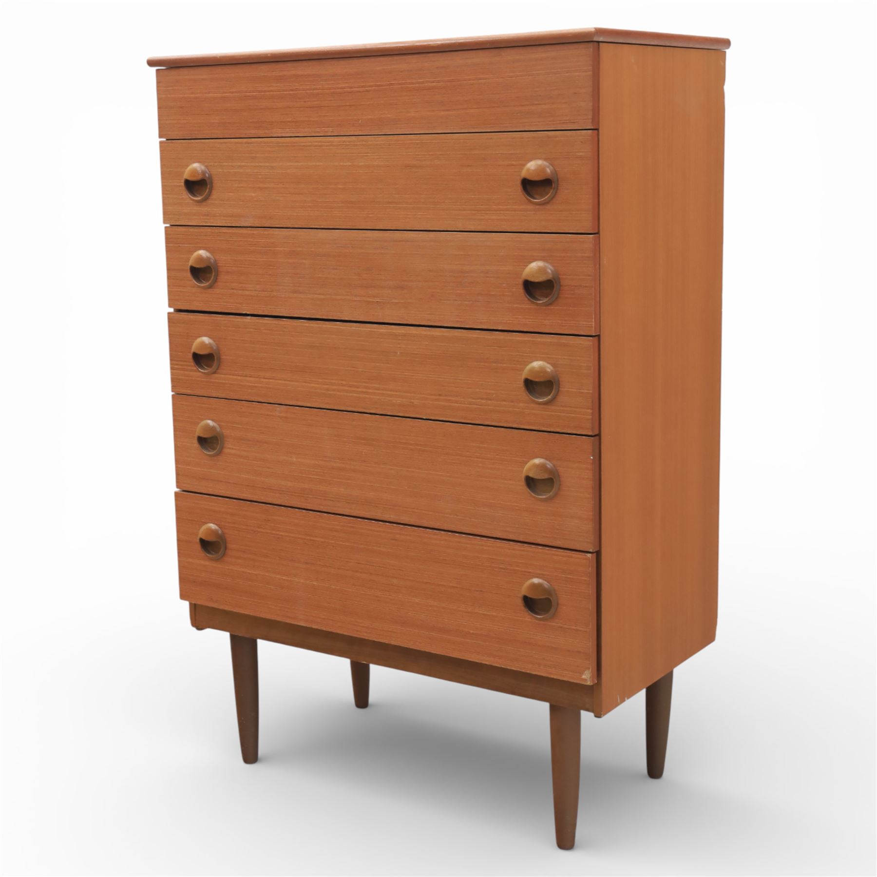 Mid 20th century teak dressing chest, rectangular top hinged to reveal a fitted interior with divisions and a rectangular mirror to the underside, over five long drawers with recessed circular handles, raised on tapering supports