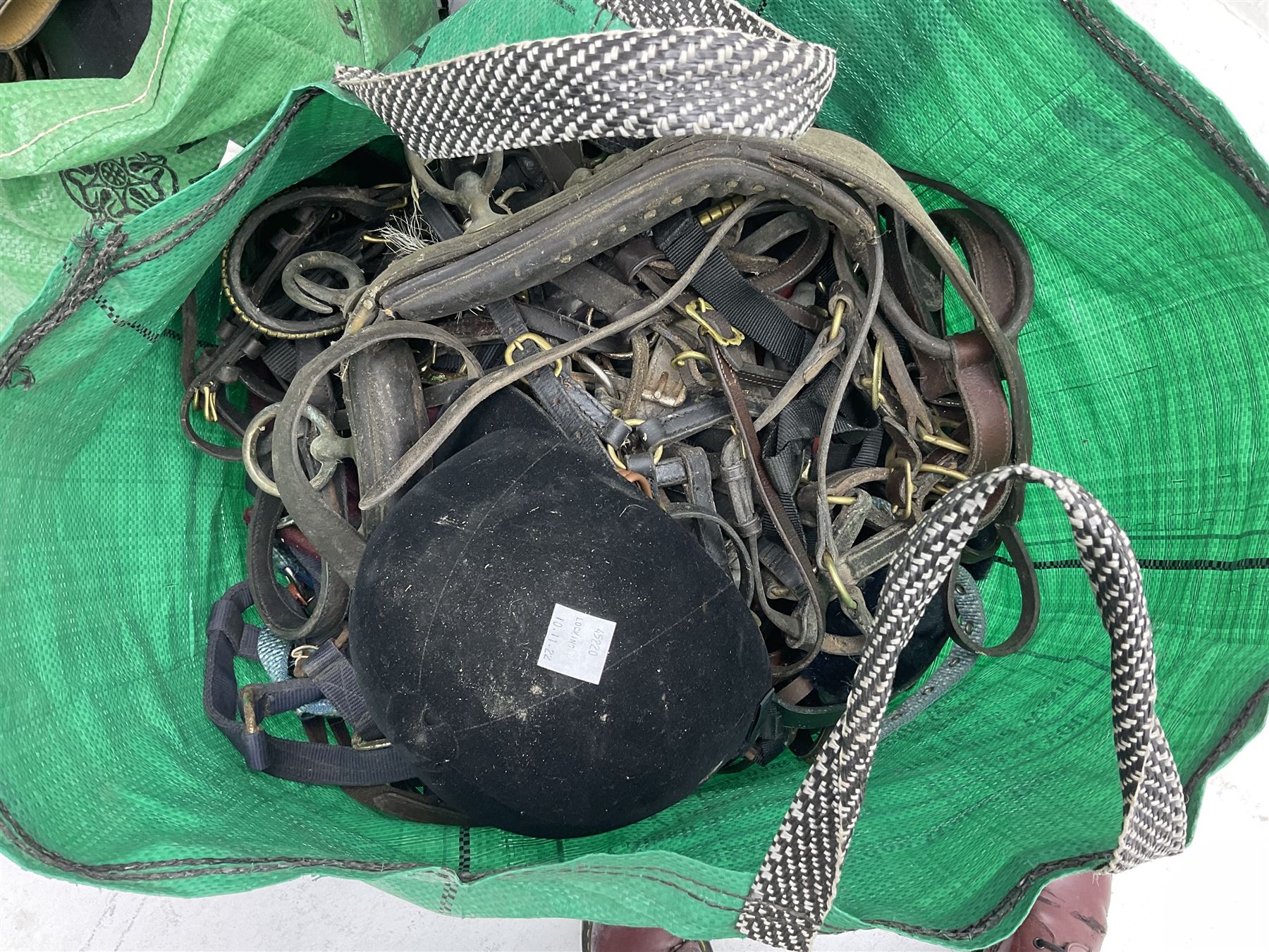 Quantity of horse tack to include bits, bridles, lunging equipment, brushing boots, tail guards, jodpa boots etc  