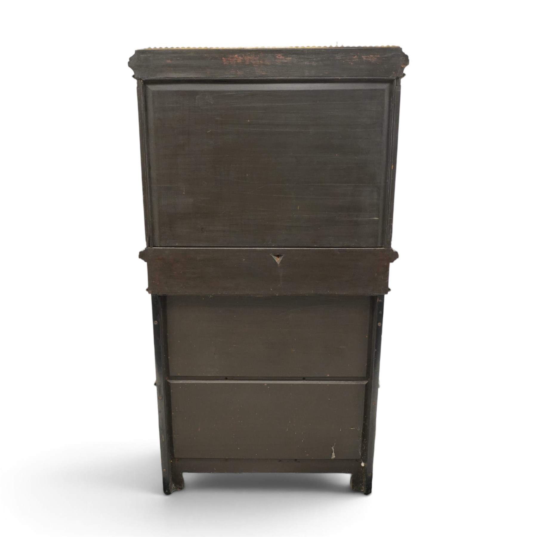 Fine late 19th century Aesthetic Movement ebony and amboyna cabinet on stand with parcel-gilt detail, the moulded cornice with pierced gilt-brass three-quarter gallery above a pair of panelled doors centred by oval porcelain portrait plaques within gilt-metal ribbon-tied frames, the doors further enriched with gilt-metal foliate mounts and flanked by classical figural terms, enclosing a shelved interior, the projecting lower section with amboyna top above a frieze drawer set with a series of floral porcelain roundels within pierced gilt-metal mounts and a central oval floral plaque, raised on turned and fluted supports with gilt-heightened detail, the mirrored back behind two amboyna shelves with pierced gilt-brass galleries, on turned feet