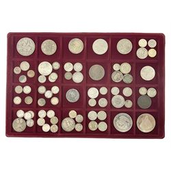 Great British and World coins including King George V 1935 crown, various silver three pence pieces, United States of America 1944 quarter dollar etc, housed in a coin tray