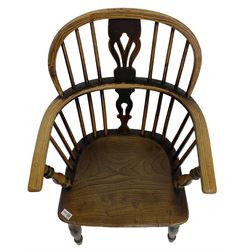 19th century elm and ash Windsor armchair, low double hoop and stick back with shaped and pierced splat, on turned supports united by crinoline stretcher