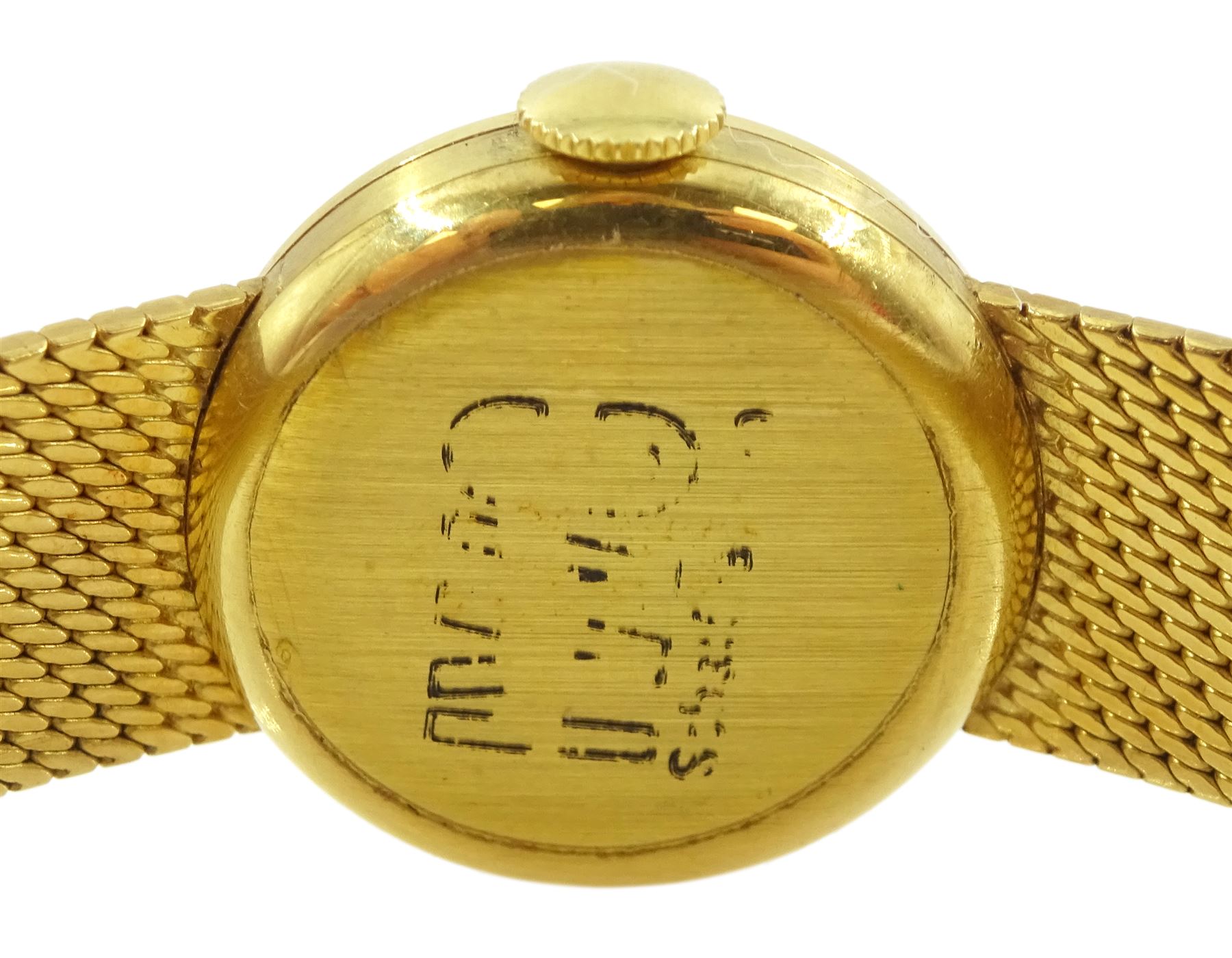 International Watch Company ladies 18ct gold manual wind wristwatch, silvered dial with baton hour markers, on integral 18ct gold bracelet, stamped 750, with guarantee dated 1968