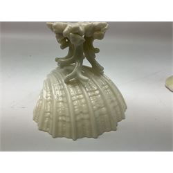 Quantity of Belleek ceramics to include mid-late 19th century jug moulded with green man mask and foliage, date code stamp for 1863-1890, together with later Belleek cornucopia shape vase, jug and other vases together with a Belleek style shell dish raised on branches, tallest H19cm