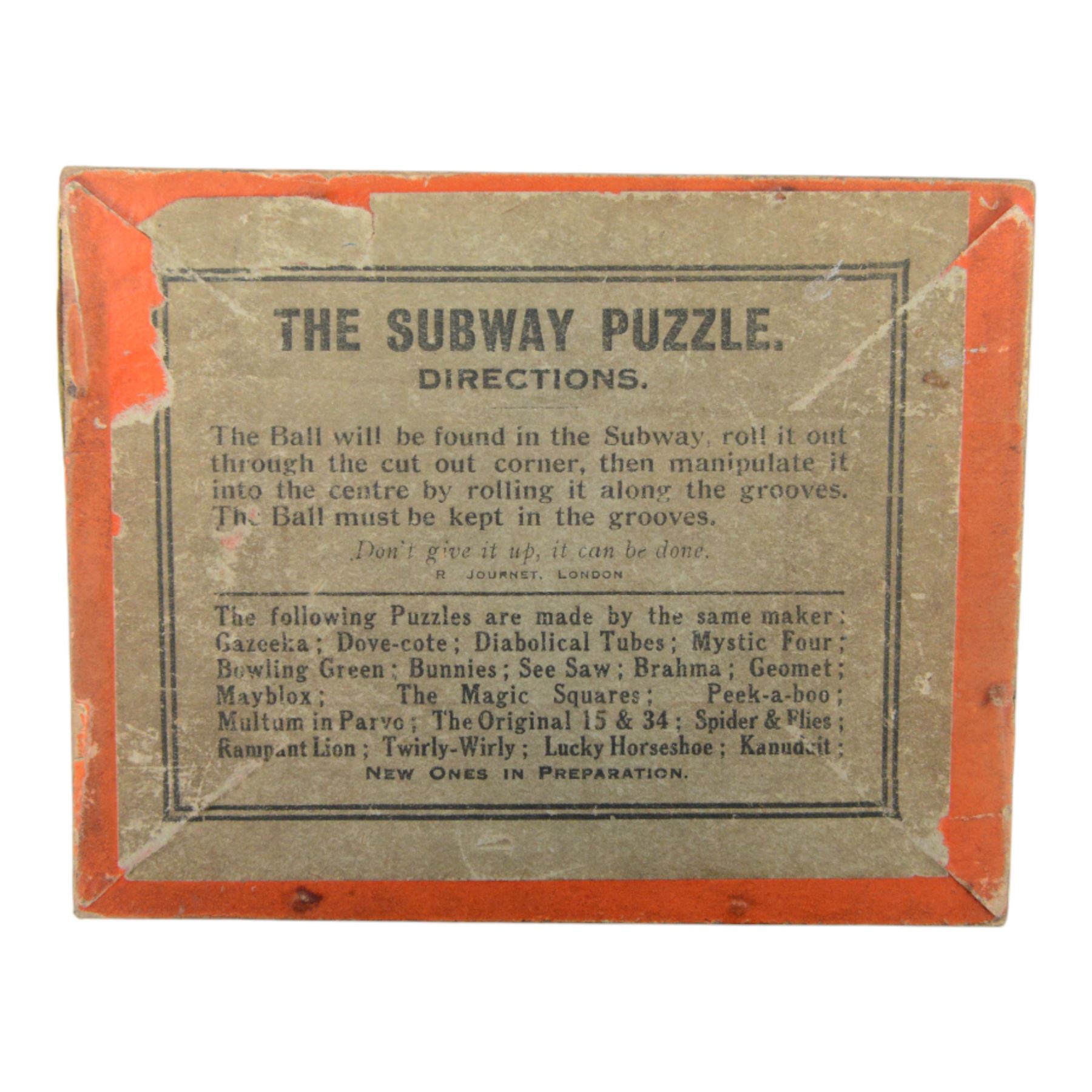Early 20th century and later puzzles and games, including Bikee, 'A Novel and Very Amusing Game', by C.W. Faulkner & Co, Multum-In-Parvo Puzzle by RJ London, The Original 15 Puzzle by RJ London, The Chinese Zig-Zag 'A Wonderful and Extraordinary Puzzle', The Subway Puzzle by R Journet London, etc, all in glazed wooden display case