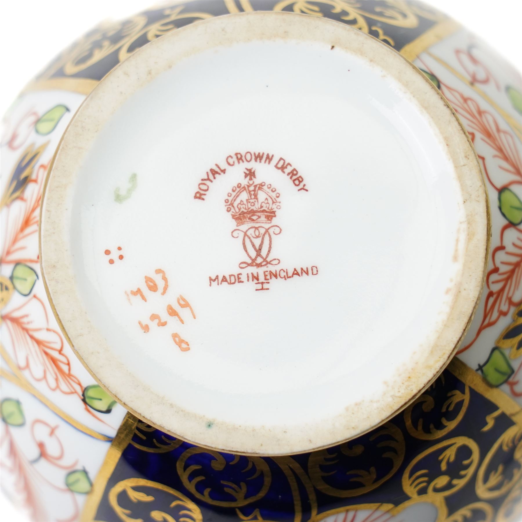 Mixed Royal Crown Derby Imari 6299 pattern wares, including a pair of vases, H8cm; covered twin handled urn, H14cm; slender vase, H19cm, and a pattern 2451 plate, D23cm (5)