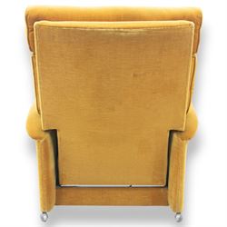 Parker Knoll - Golden yellow velour recliner, raised on castors