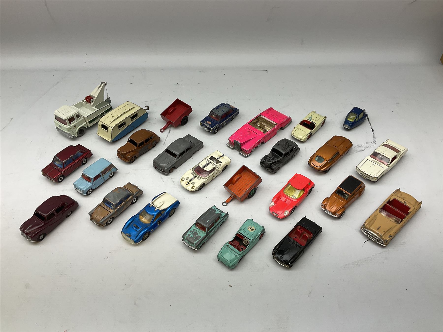 Dinky - twenty-five unboxed and playworn die-cast models including Lady Penelope FAB1, Caravan, Ford Sedan, Triumph TR2, Packard, Austin Somerset, Devon, Healey and Seven Countryman etc (25)