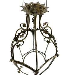 19th century brass and clear glass hexagonal hall lantern, with scrolling wire work open domed top over six arched panels, including a hinged door, the base enclosed with a circular glass panel on turned feet, H64cm