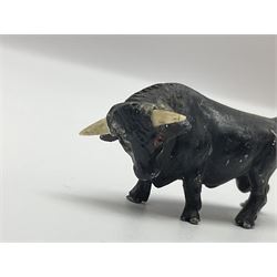 After Bergmann, three cold painted bronze figures of bulls in graduating size, tallest H3cm