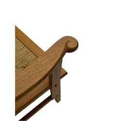 Reynold Eunson (1932–1978) for David Munro Kirkness, Kirkwall, Orkney - oak framed Orkney chair, woven straw canopy back, drop-in rush seat, the arm terminals carved with scrolls, on square tapering supports joined by plain stretchers, the front rail inscribed with makers marks