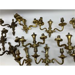 Quantity of brassed twin branched wall sconce lights and similar single light fittings