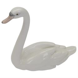 Nine Lladro figures, including  Polar Bear figure group no 1443, three polar bears, swan etc 