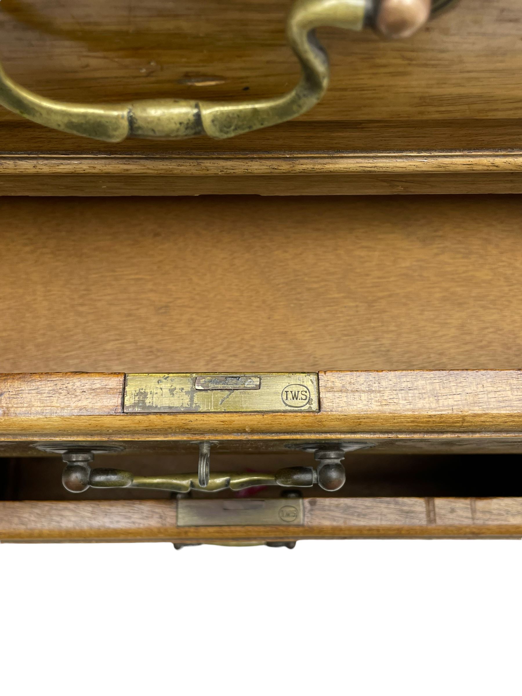 Early 20th century mahogany twin pedestal desk, the moulded rectangular top with three sectional leather insets with gilt decoration, fitted with eight drawers, on cabriole feet