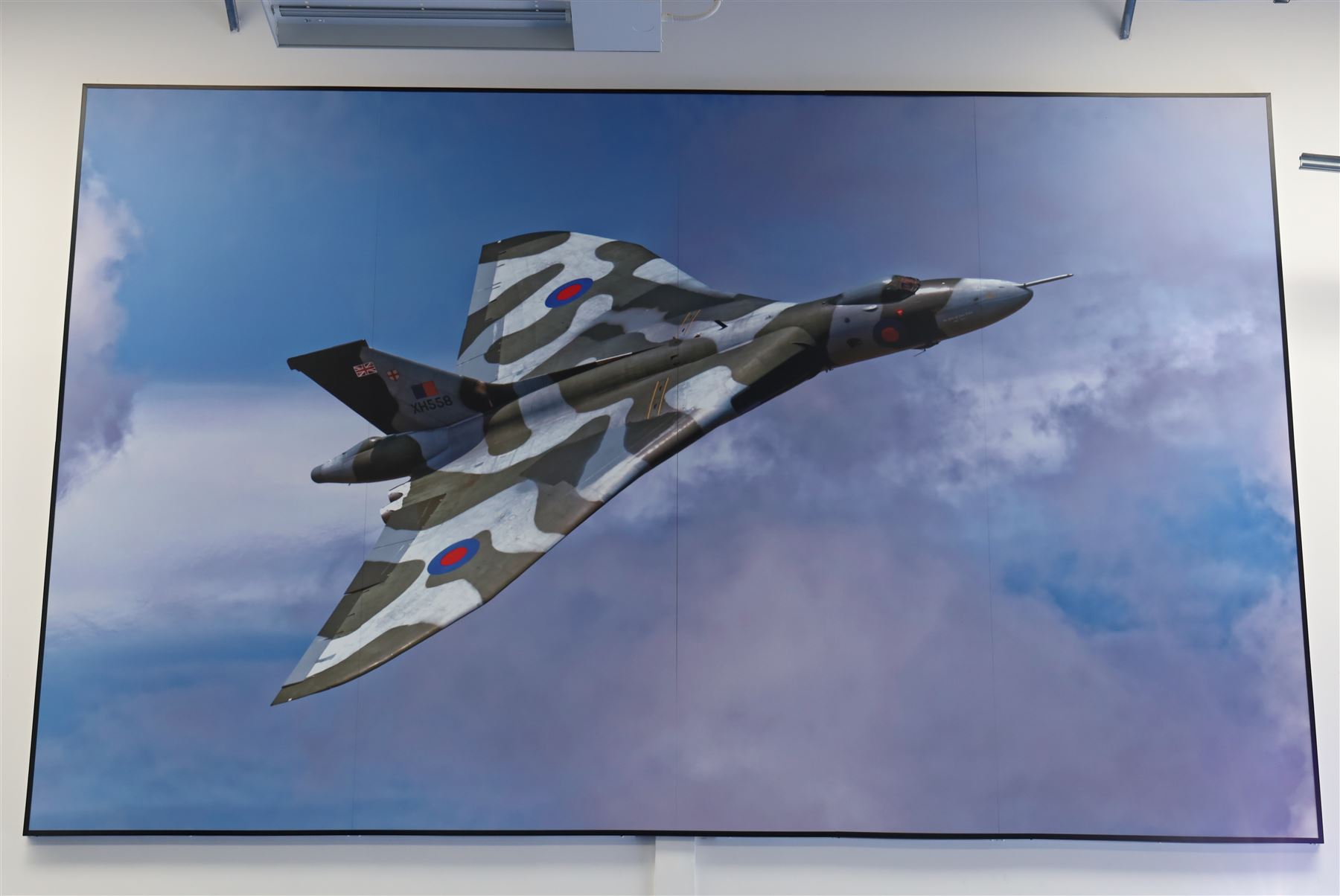 Large three piece print of an Avro Vulcan B2 XH558 plane, on three sections of foamex