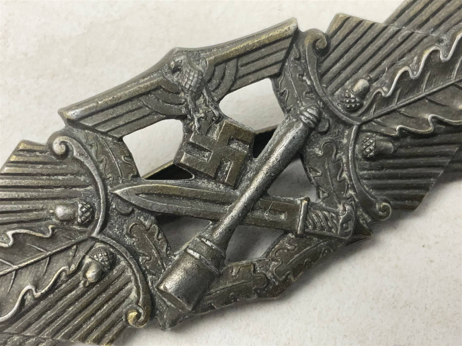 Three WW2 German badges - Close Combat Clasp; Army Flak badge; and Wound badge