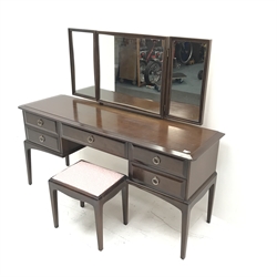 Stag mahogany dressing table, raised three piece mirror back, five drawers, square tapering supports (W153cm, H130cm, D50cm) and a matching stool