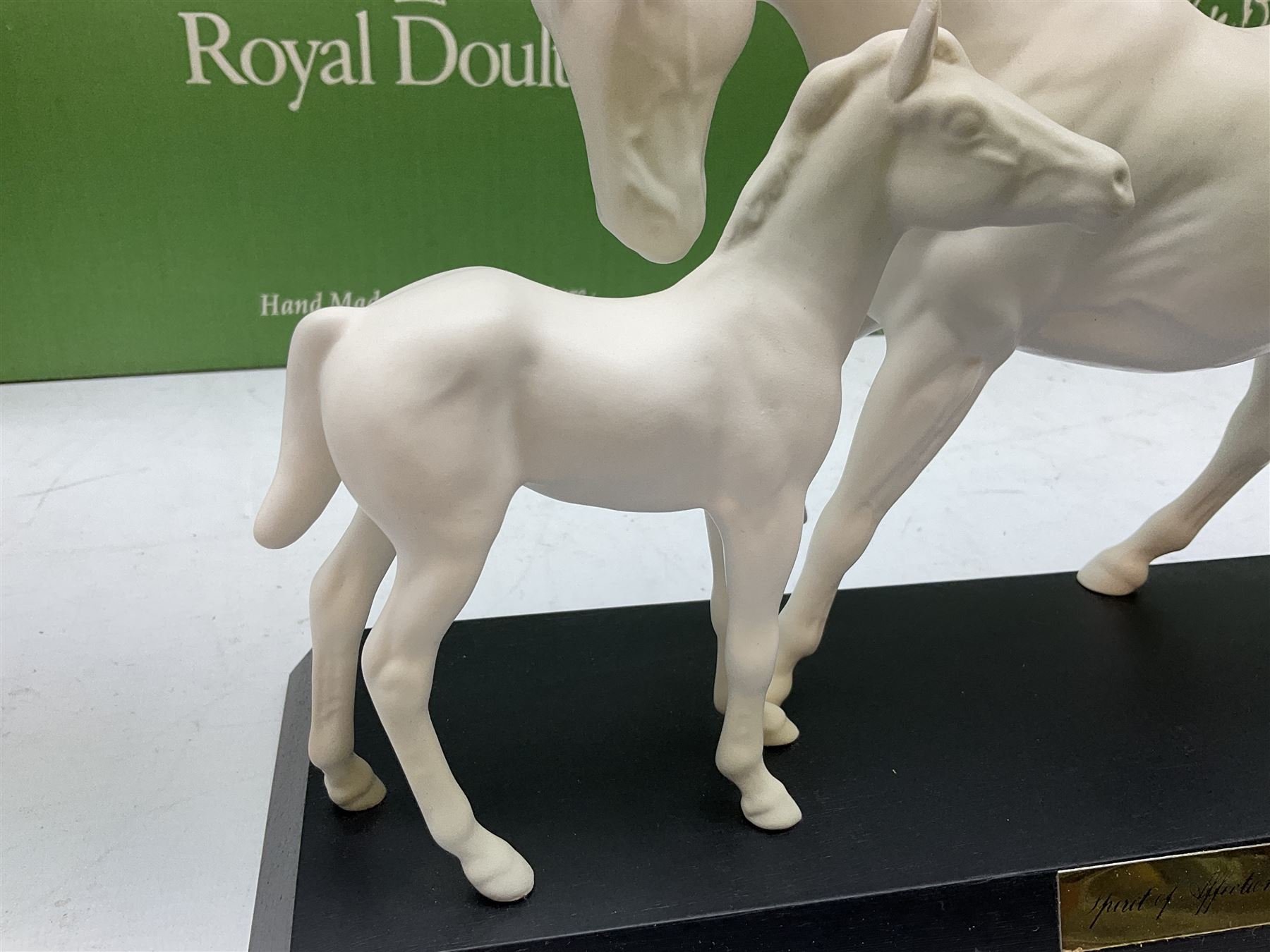 Five Beswick and Royal Doulton horse figures in matt white on black plinths, comprising of  Spirit of Affection no. 2689/2536, Springtime no.2837, Spirit of peace no.2916, Spirit of earth no.2914 and Spirit of the wild no. 183, together with a composite figure of a horse (6)