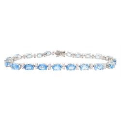 18ct white gold oval aquamarine and round brilliant cut diamond bracelet, hallmarked, total aquamarine weight approx 14.00 carat