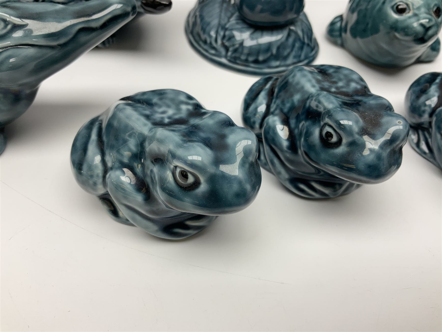 Collection of Poole pottery animals, including frogs, owls, otters, dolphins, mice etc, all with printed mark beneath (23)
