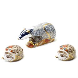 Three Royal Crown Derby paperweights, comprising two of Bramble the Hedgehog, with gold st...